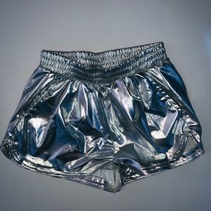 Women’s adult small silver metallic shorts.